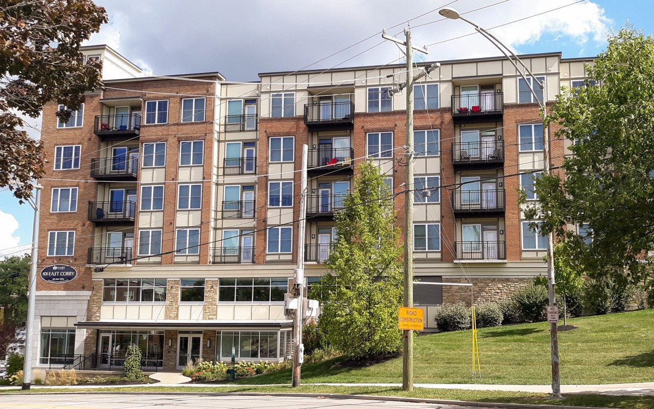 Exterior of 101 East Corry. There is a grass area to the front and right of the building.