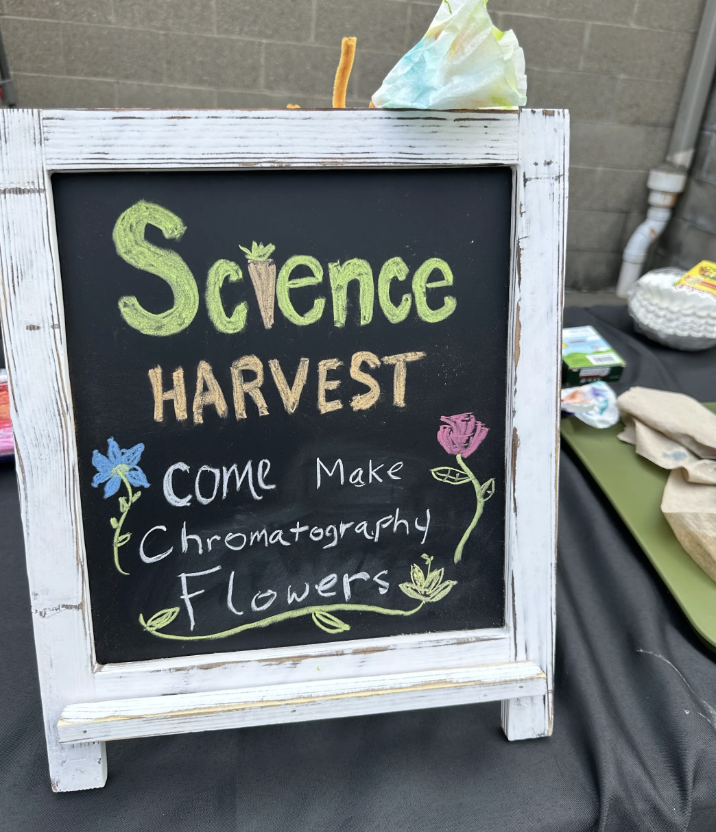 Sign welcoming visitors to Science Harvest. 