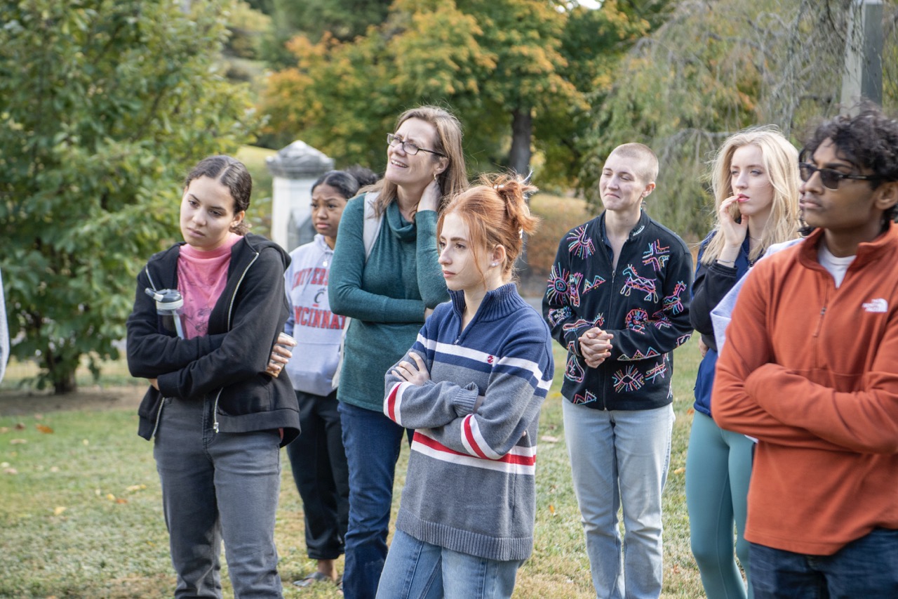Group of students standing in a park 