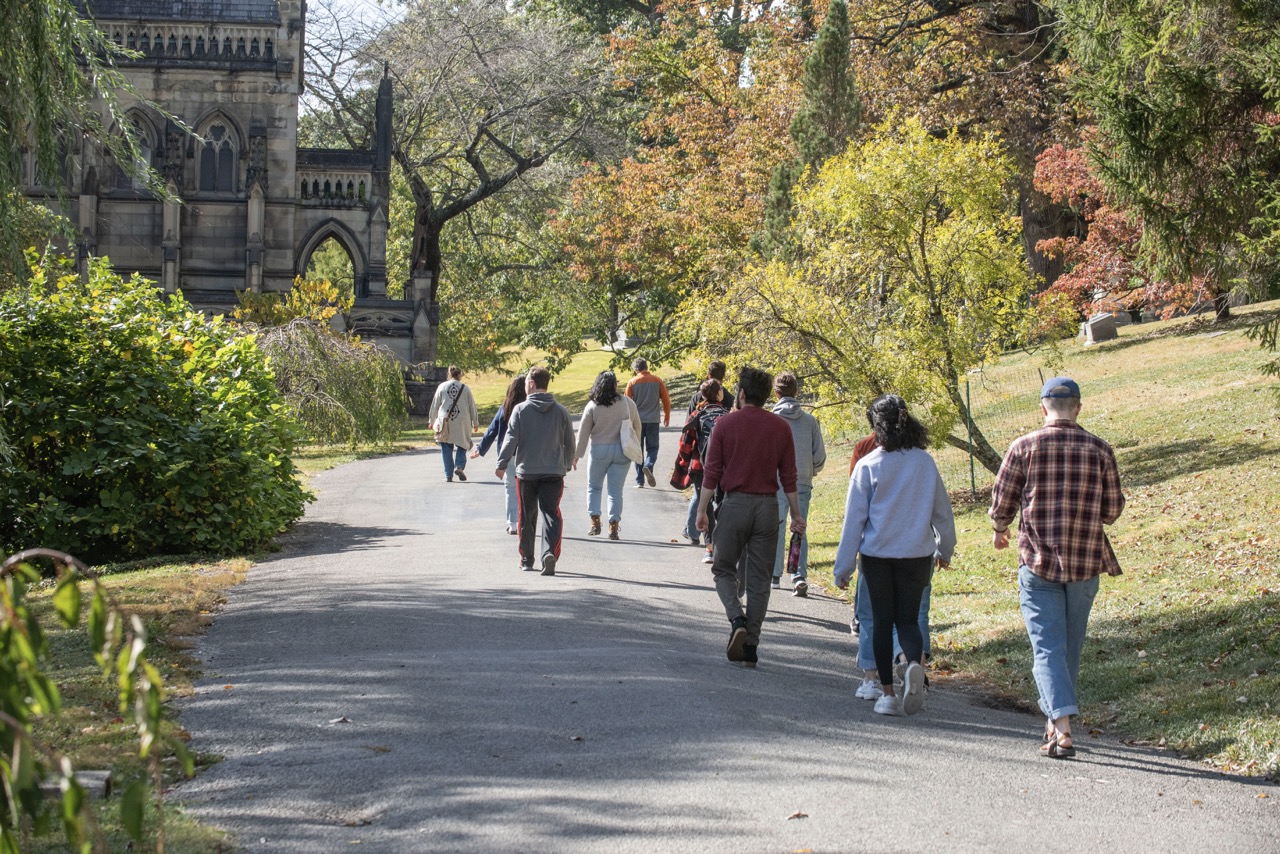 Group of students walking along a path 