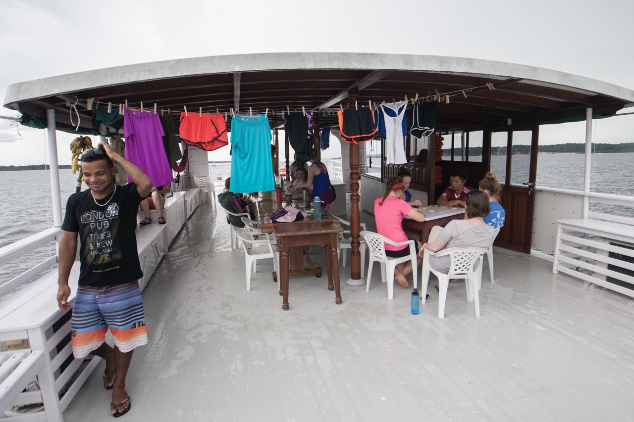 Students on a boat in the Amazon river