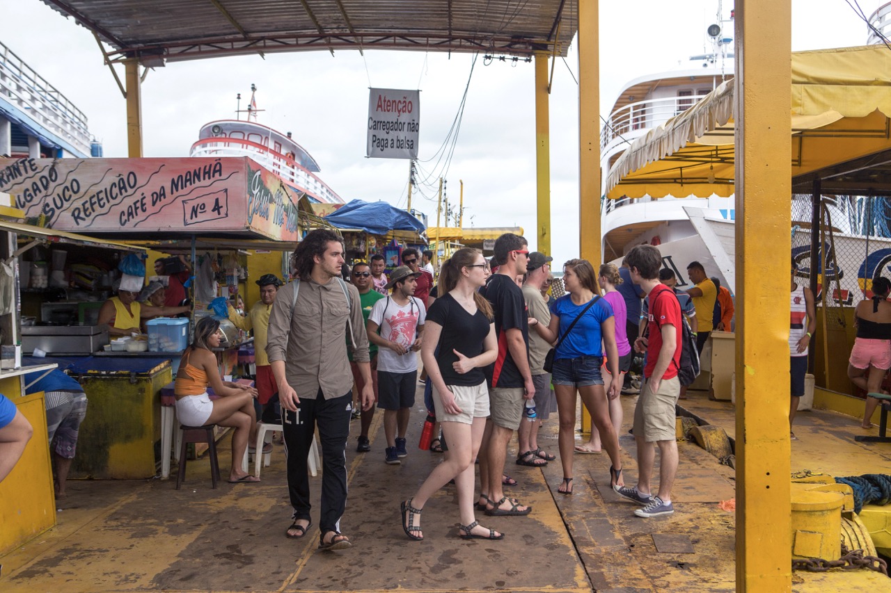 Students looking at a market on the Amazon River trip 
