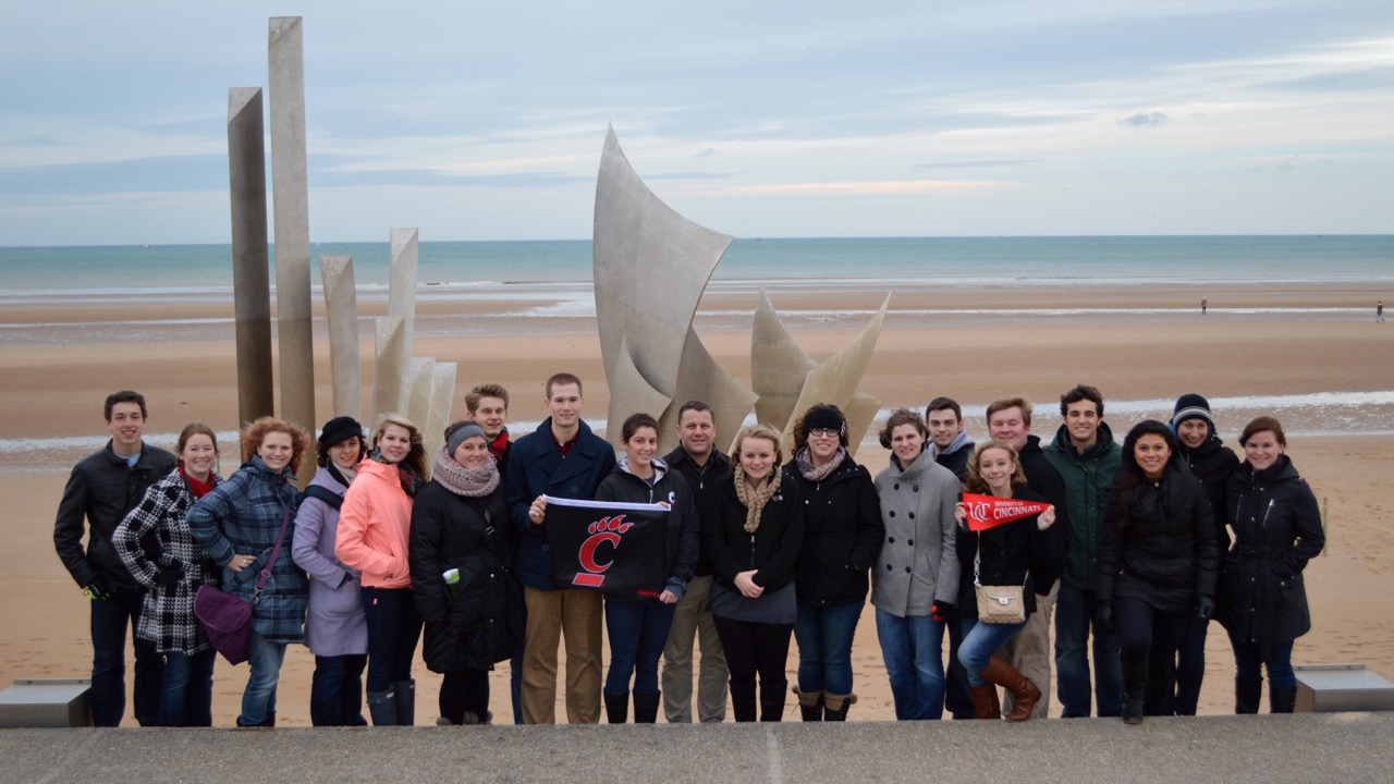 Students standing on Normandy beach
