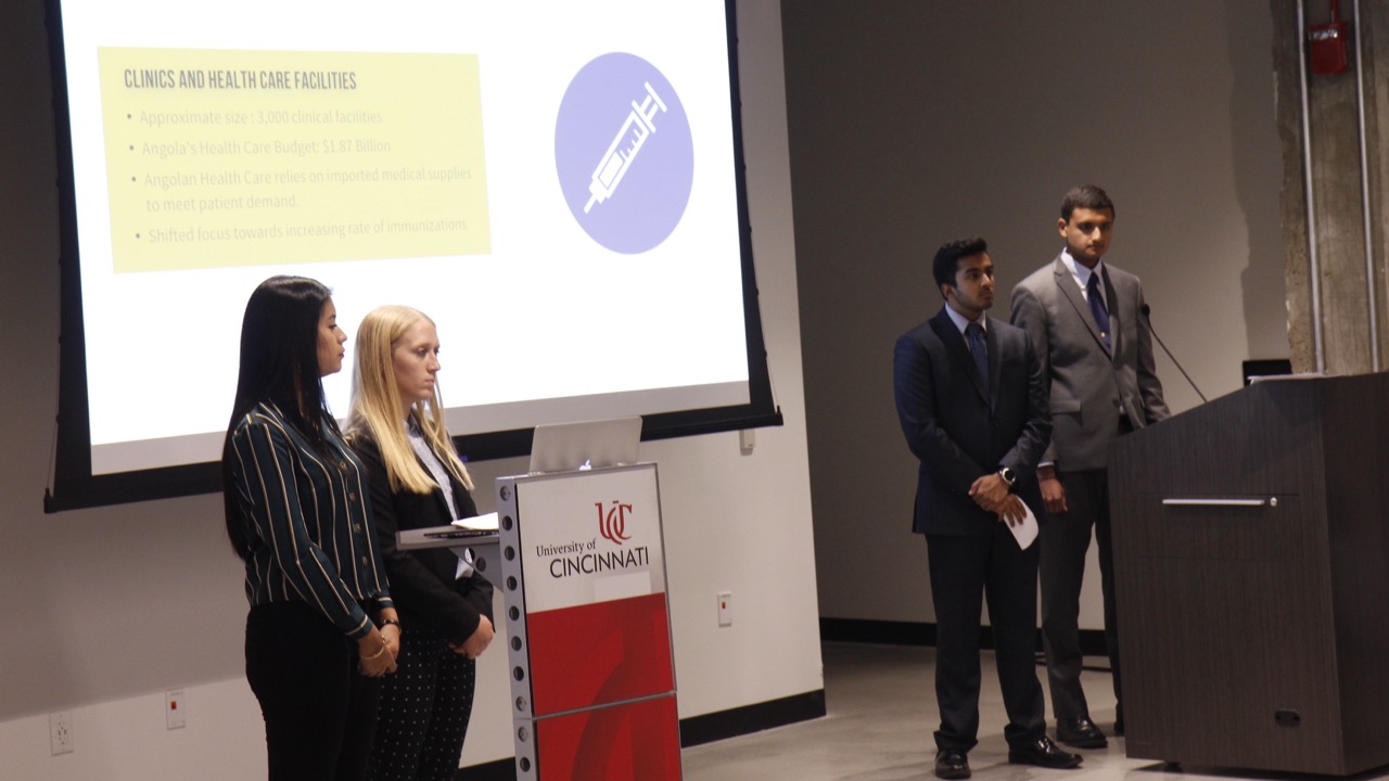 2 students giving a presentation 