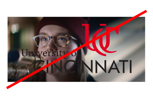 A crossed out University of Cincinnati logo incorrectly place over a photograph