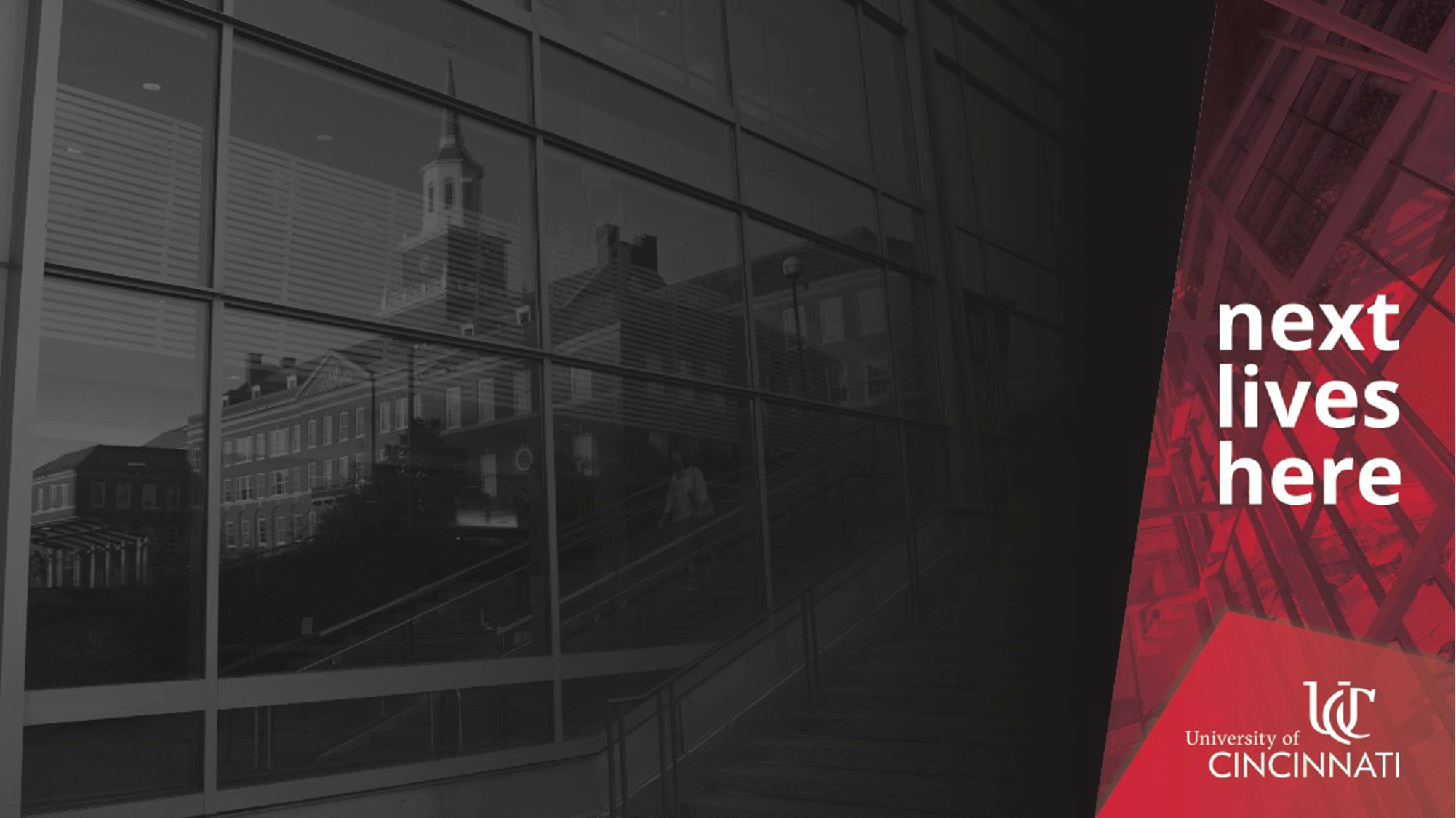 Next Lives Here PPT Template / Dark background featuring a reflected image of campus with "Next lives here" on right hand side.