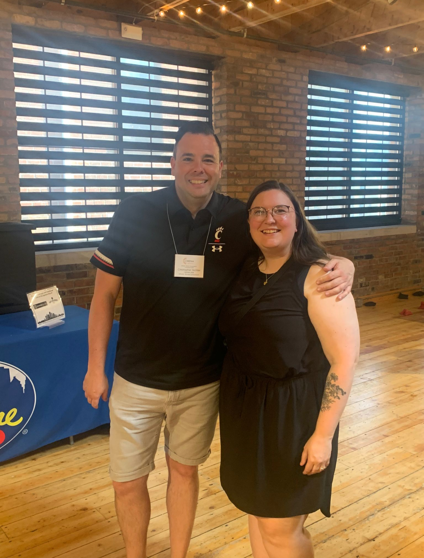 Bearcat Bands Director Chris Nichter and UC Band Alumni Association President Natalie Ochmann