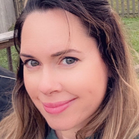 Brenda outside smiling