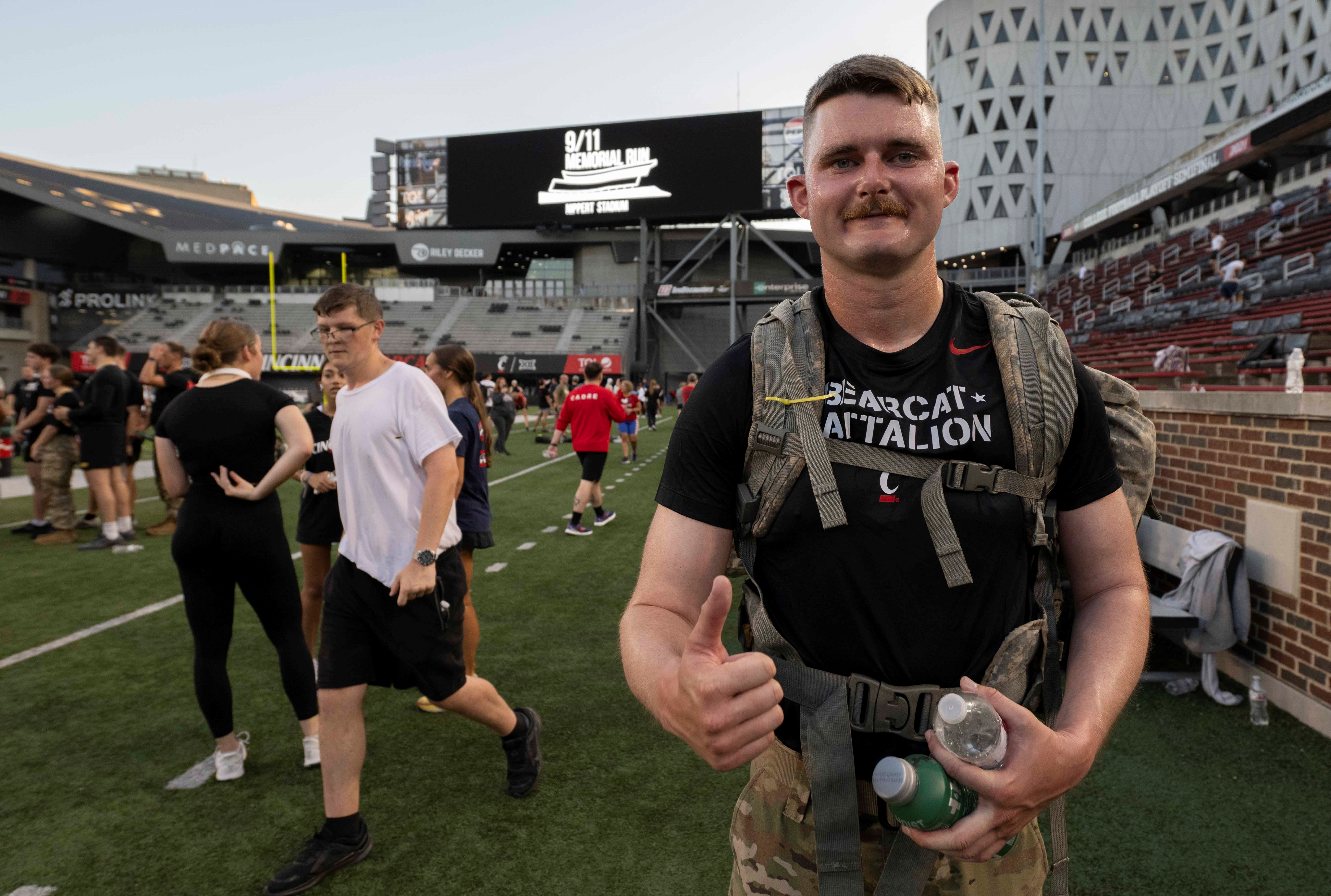 ROTC cadet Zane Mustard giving a thumbs up after the run. 