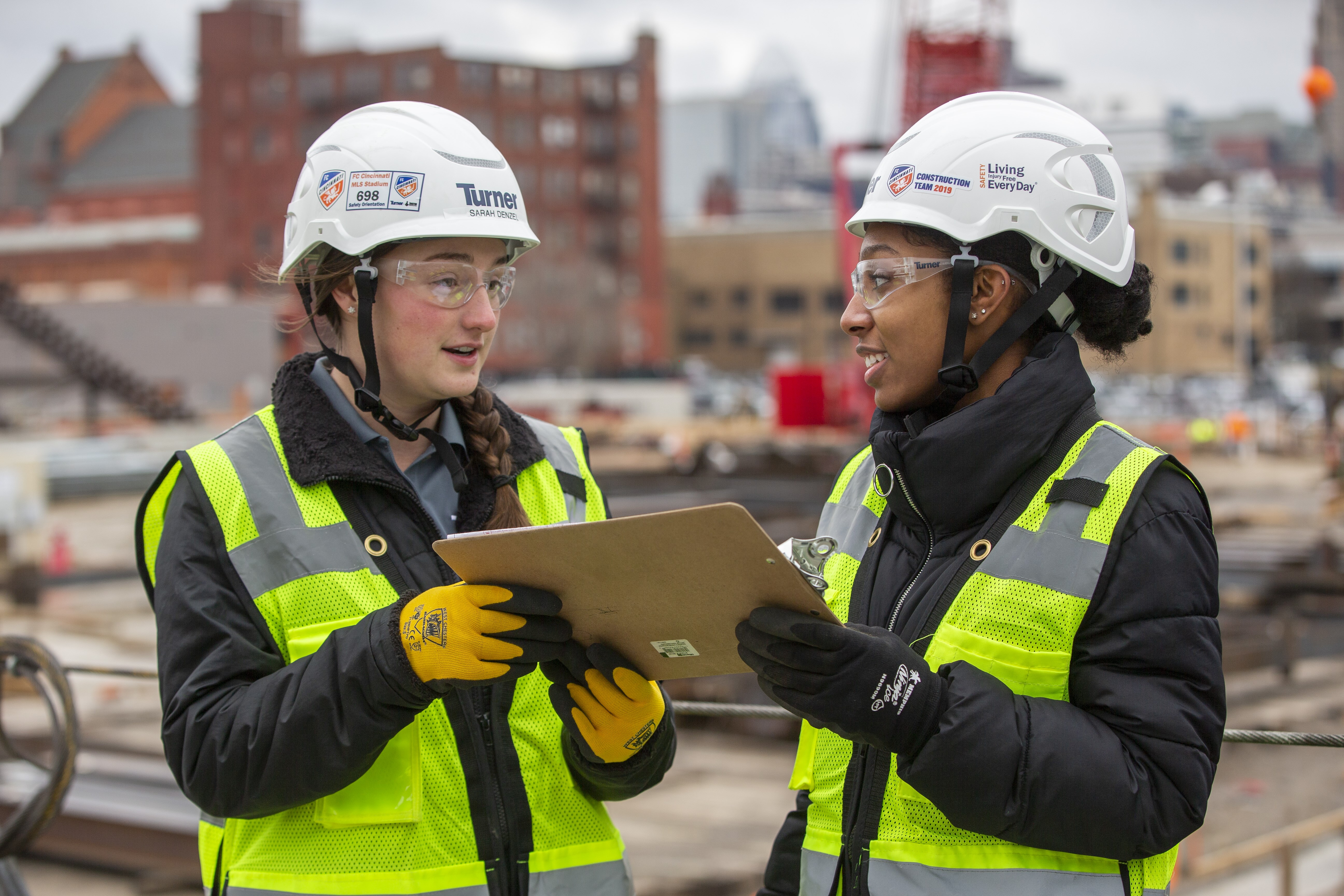 Two students on co-op doing construction on Turner Hall