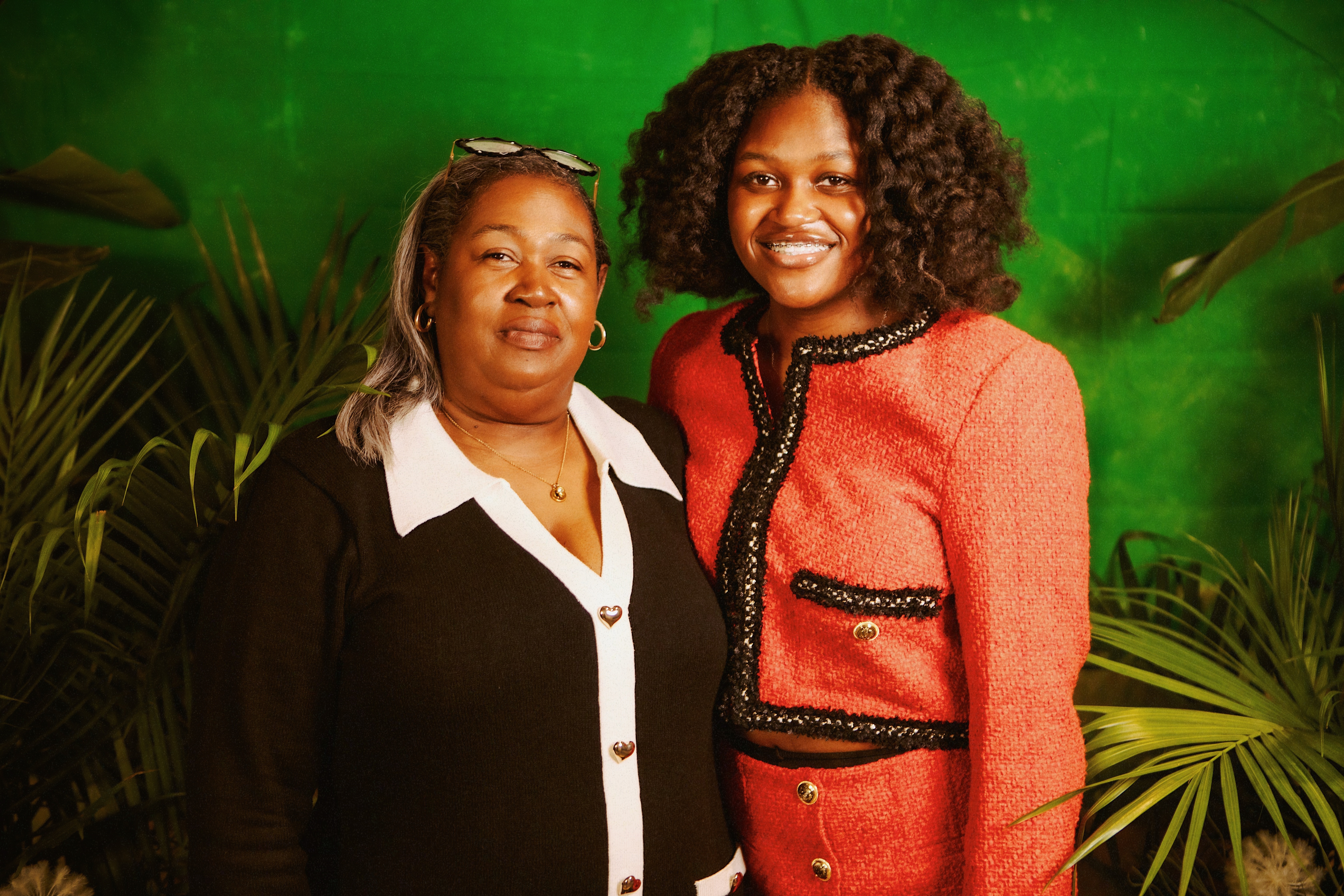 UC Marian Spencer Scholar, Benya Coleman, standing with her mom.