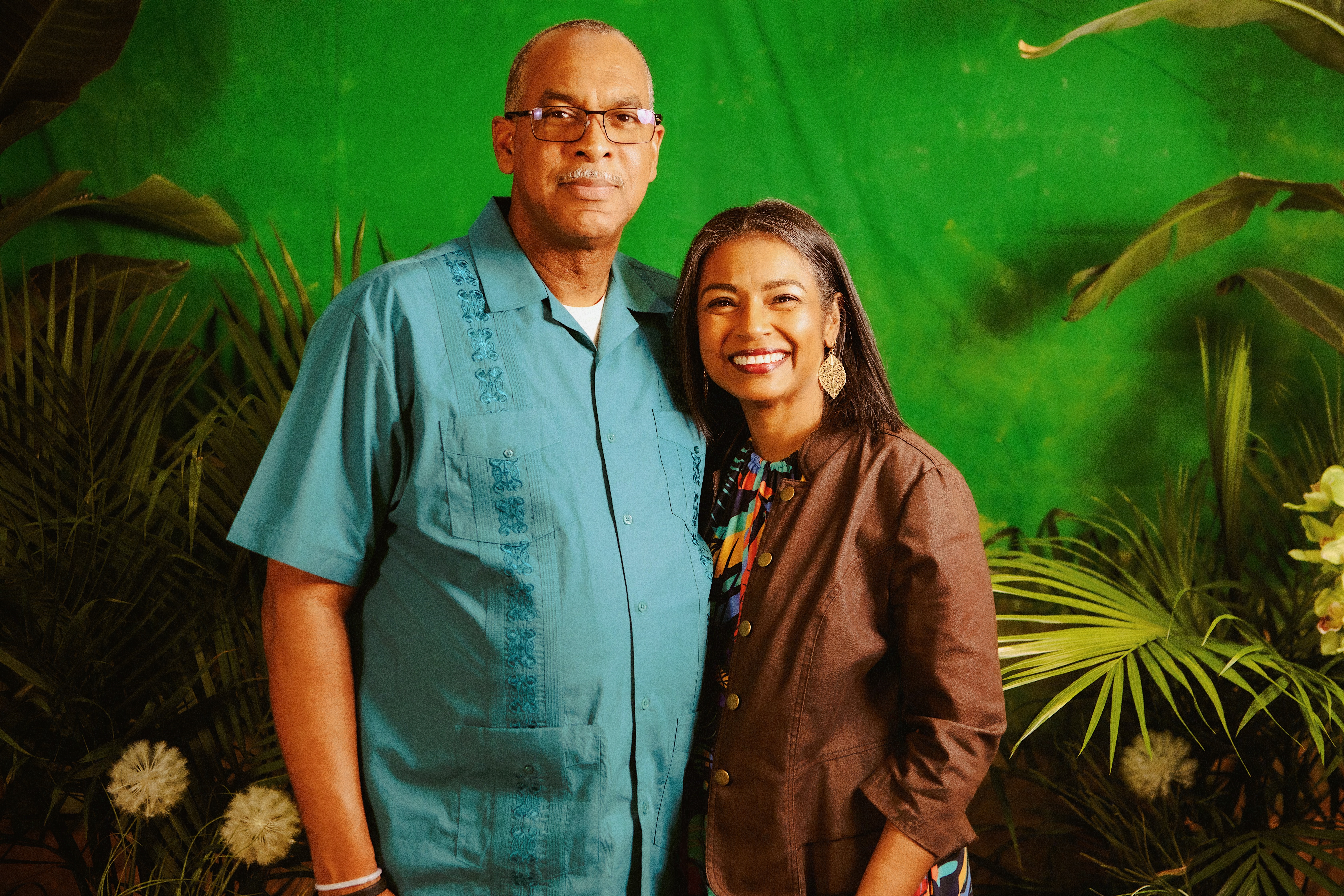 UC Health CFO, Charmain Rochester and husband standing together.