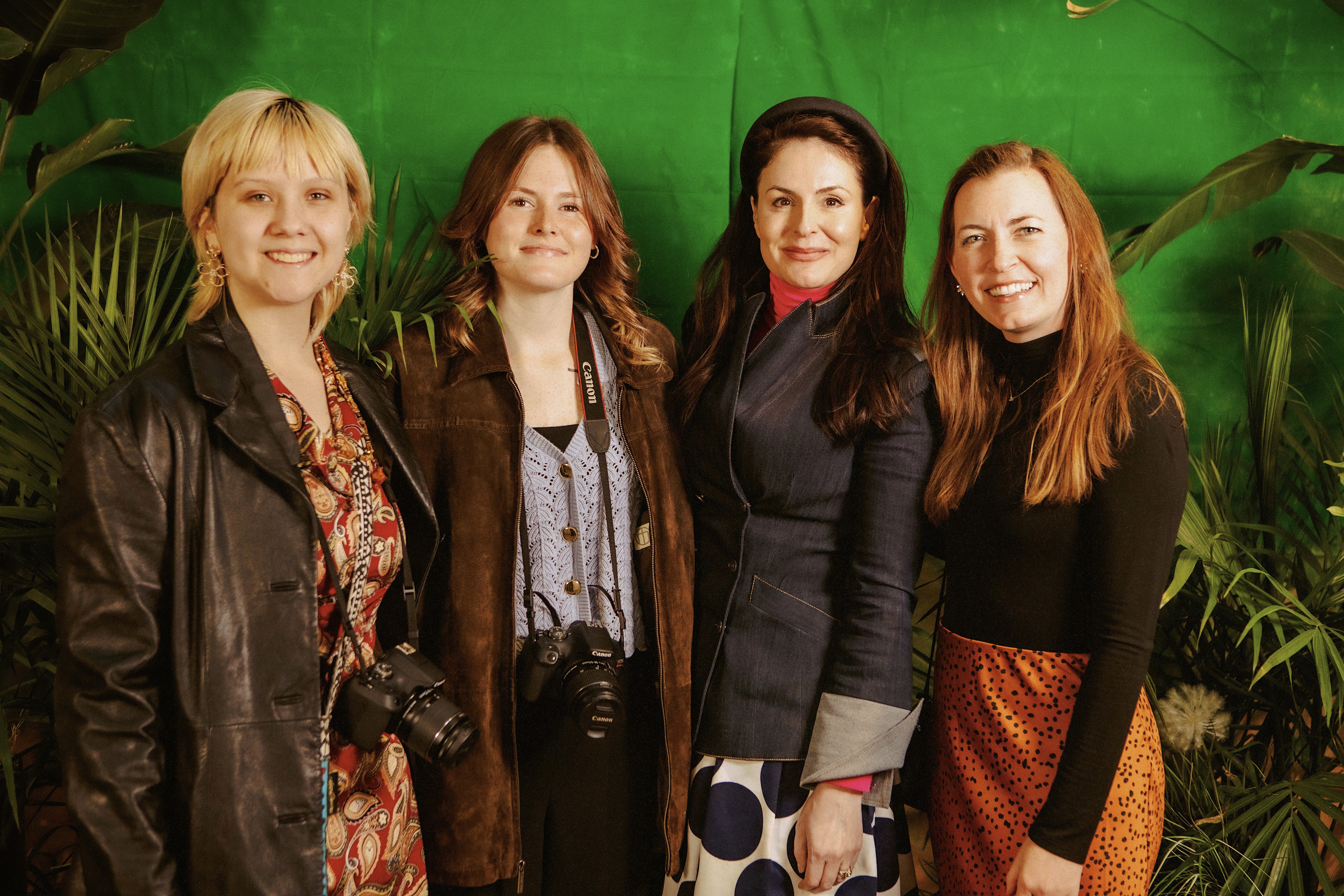 Village Life Board Member, Nicola Ziady standing with UC staff members.