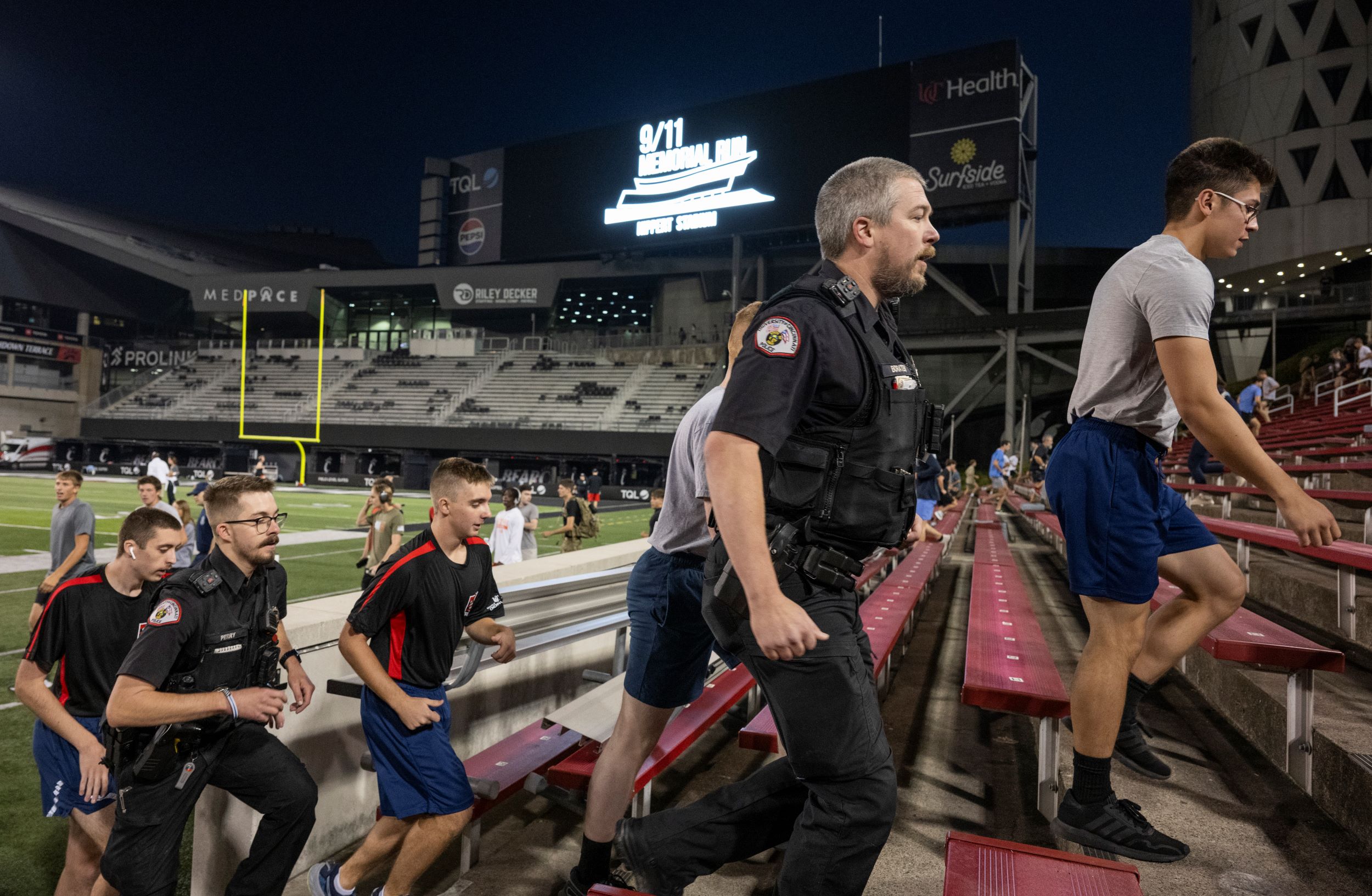 First responders join students and other participants in the feat. Photo/Clare Taphorn