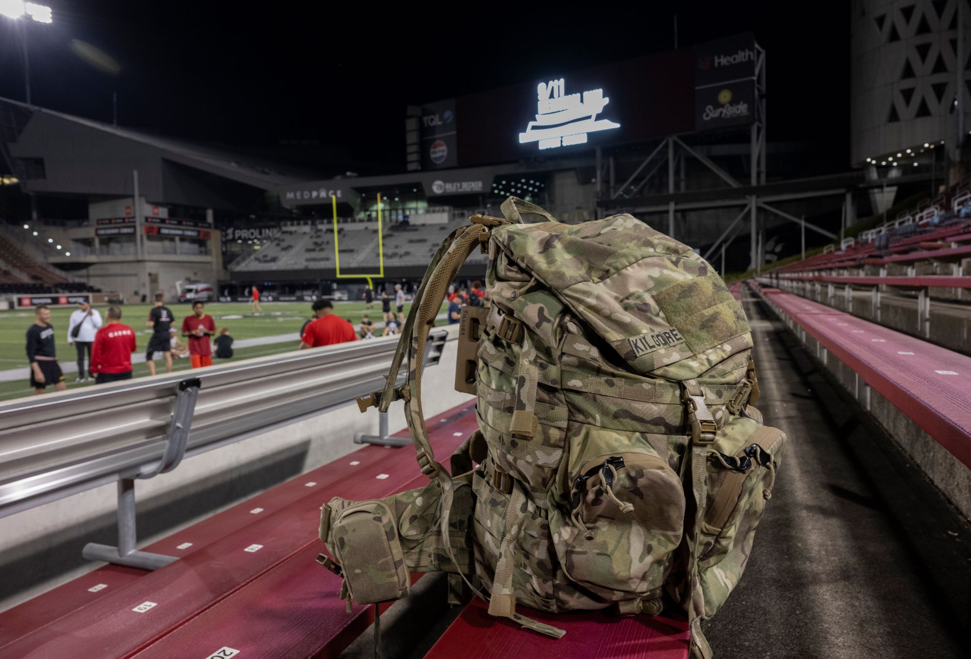 camoflauge backpack with the name Kilgore on a patch