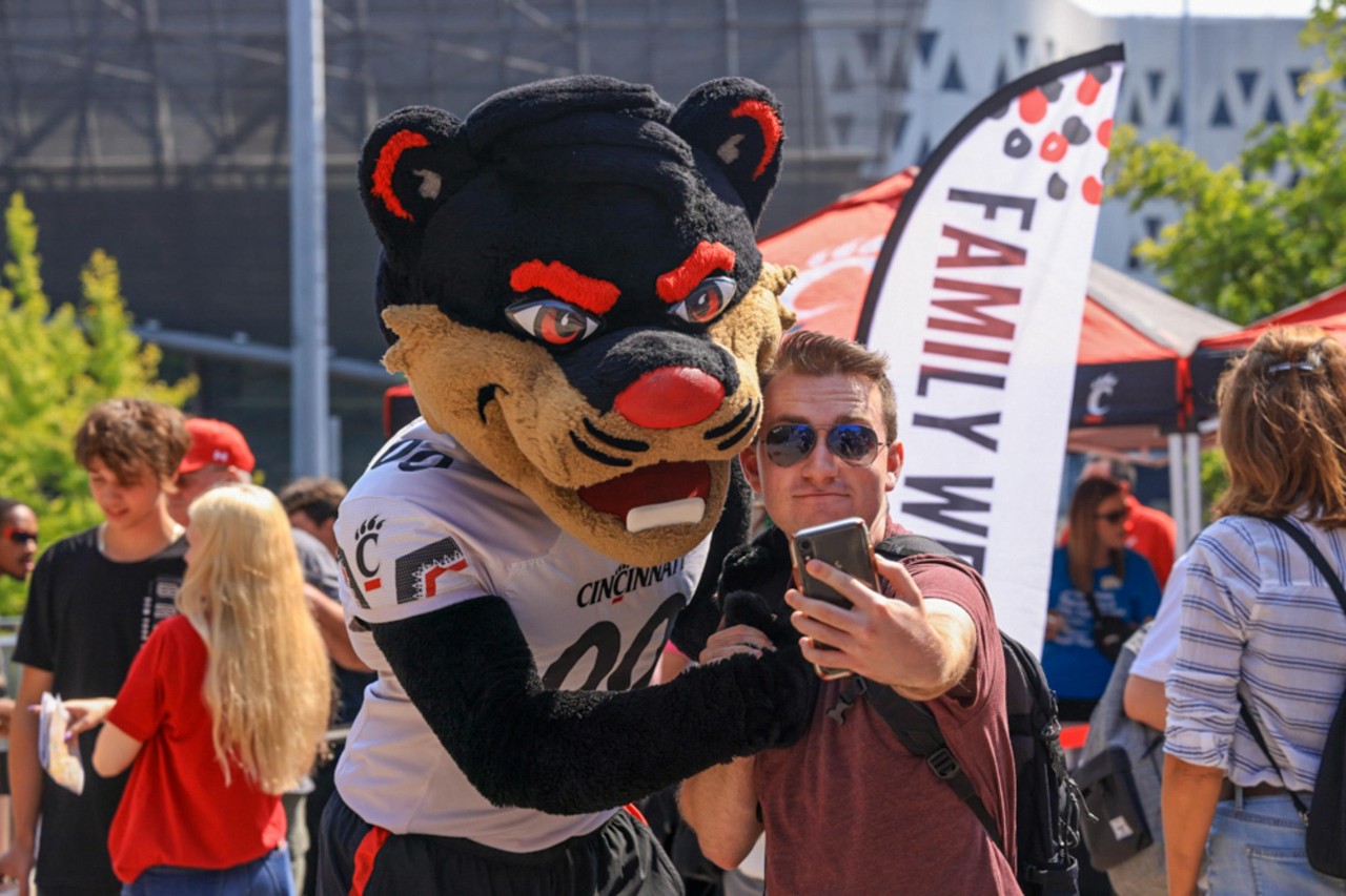 Many people grabbed a quick picture with the bearcat mascot while at the pep rally or while waiting in the family weekend check in line.