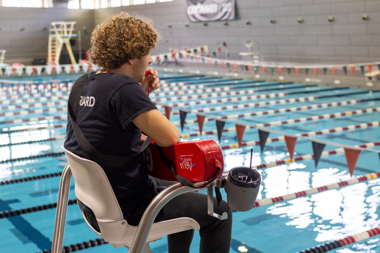 Lifeguard watching UC lap pool 