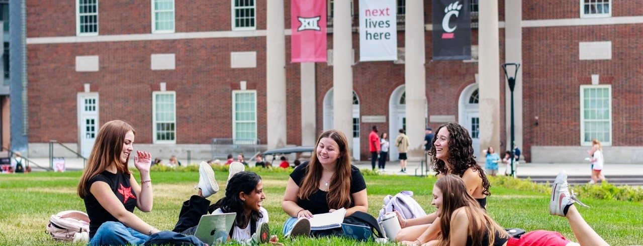 Students studying on Bearcat Commons