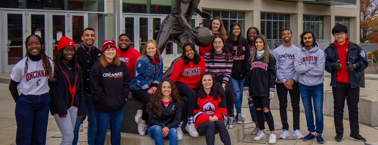 Group of students wearing UC spirit wear