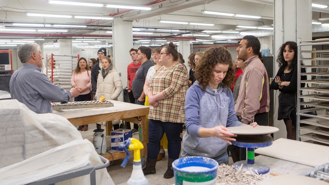 Students making pottery