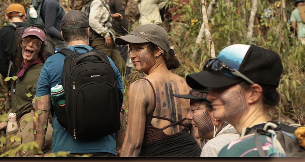 Students walking through jungle area in Brazil