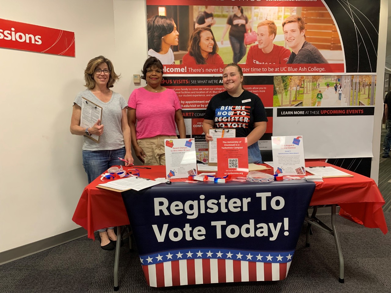 UC Votes student worker and community partners registering students to vote at UC Blue Ash