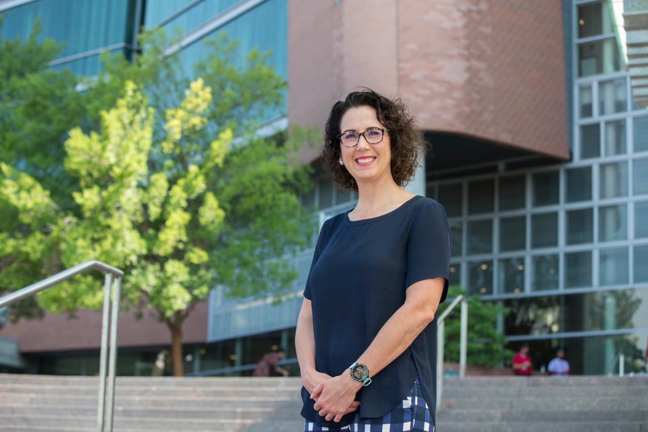 Pamela Baker, PhD, shown in front of the College of Medicine.