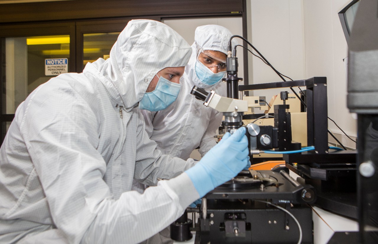 Professor Rashmi Jha and student Tommy engaging in some research in Clean Room at ERC. UC/Joseph Fuqua II