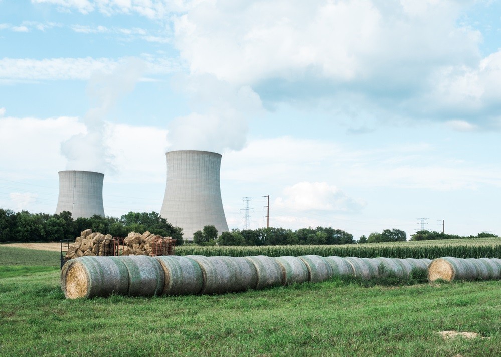 view of byron nuclear power plant cooling towers from farm