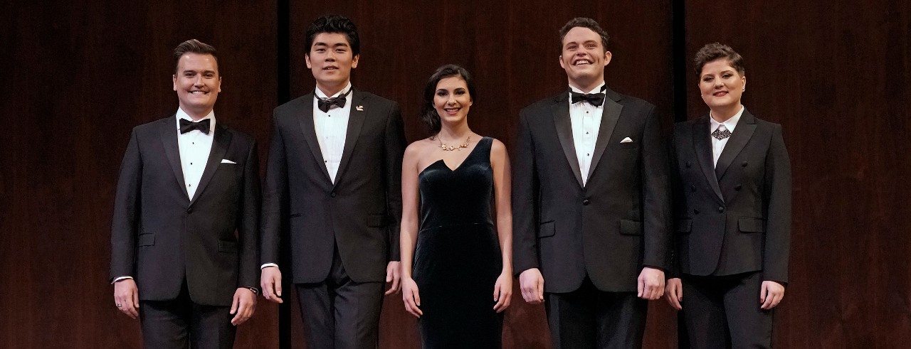 A picture of the five winners of the Metropolitan Opera's National Council Auditions, which includes CCM student Elena Villalón in the center.