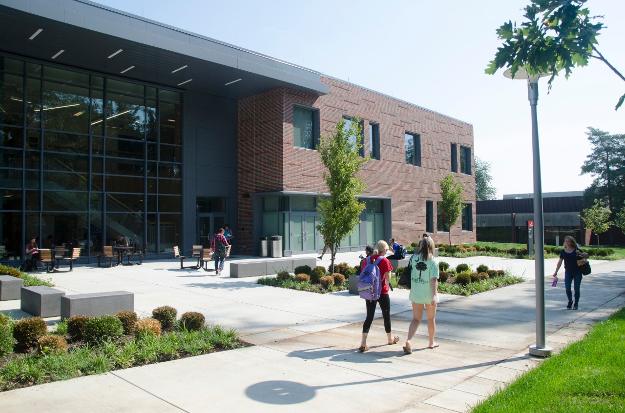 Students walking outside Progress Hall at UC Blue Ash