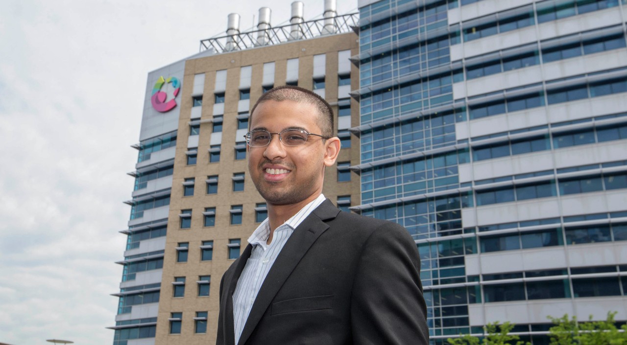 Chinmay Bakshi, University of Cincinnati student shown here with Children Hospital in the background. UC/ Joseph Fuqua II 
