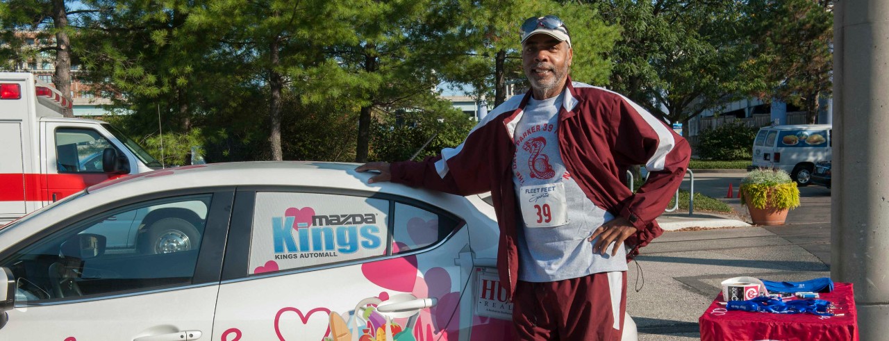 Dave Parker in front of car