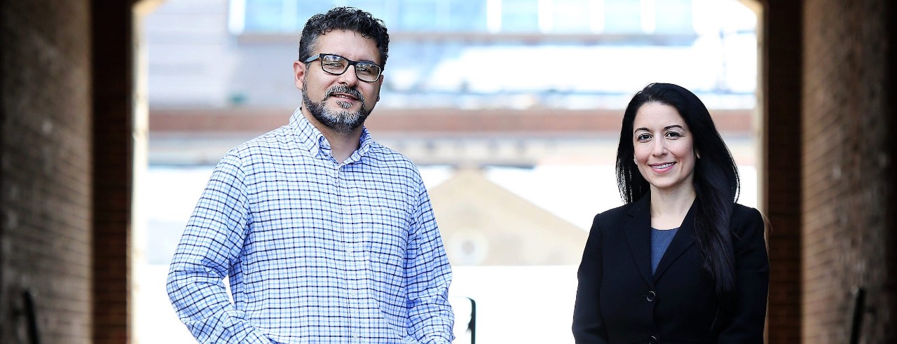 J. Mauricio Espinoza and Maria Espinola pictured outdoors on campus