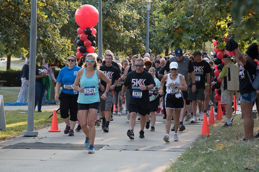 Runners starting the UC Blue Ash Dash 5k