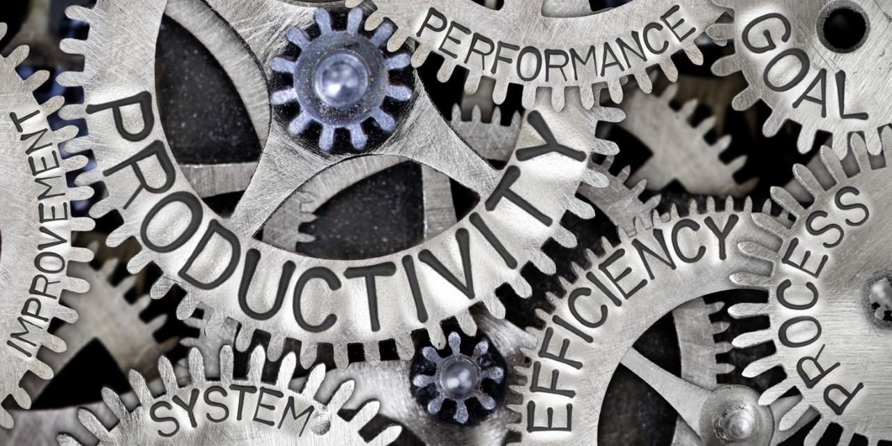 A graphic of machinery with the words productivity, efficiency, performance and goals on the cogs.