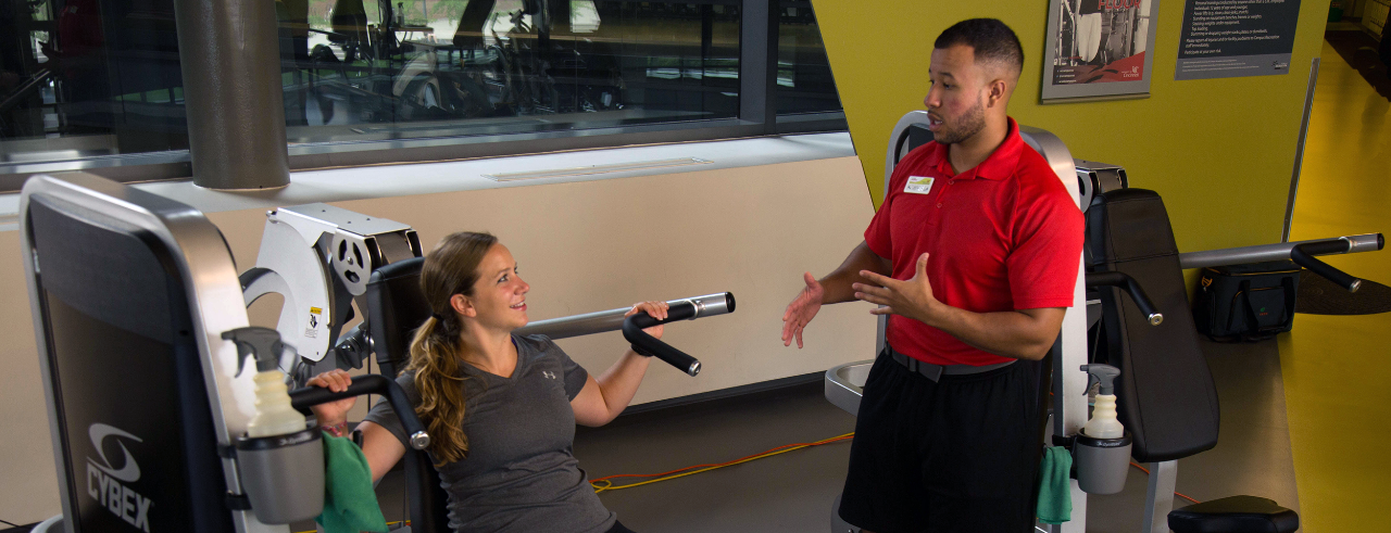 Woman working out with a personal trainer