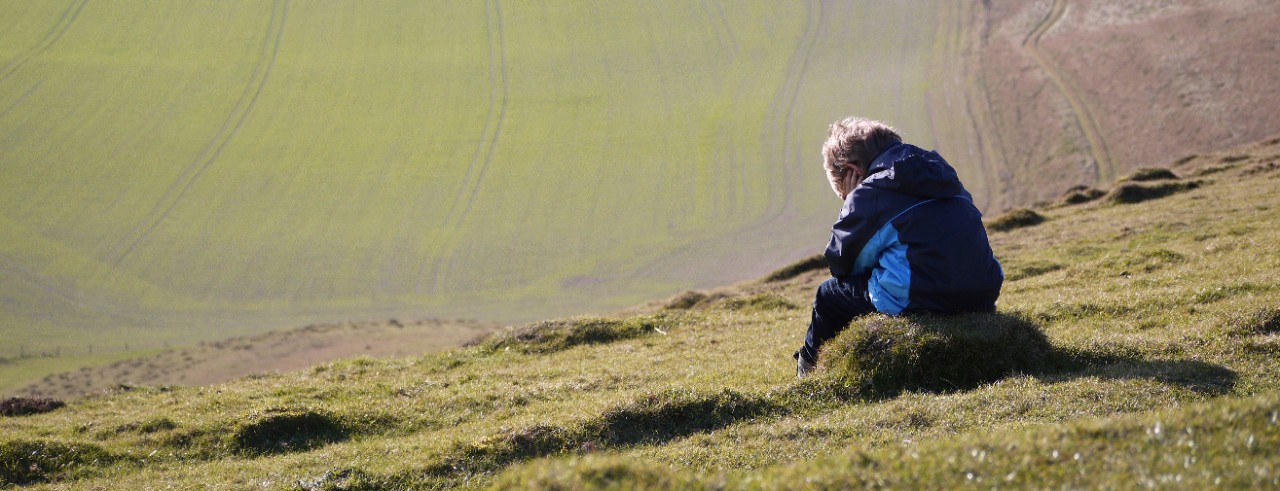 Child overlooking field 