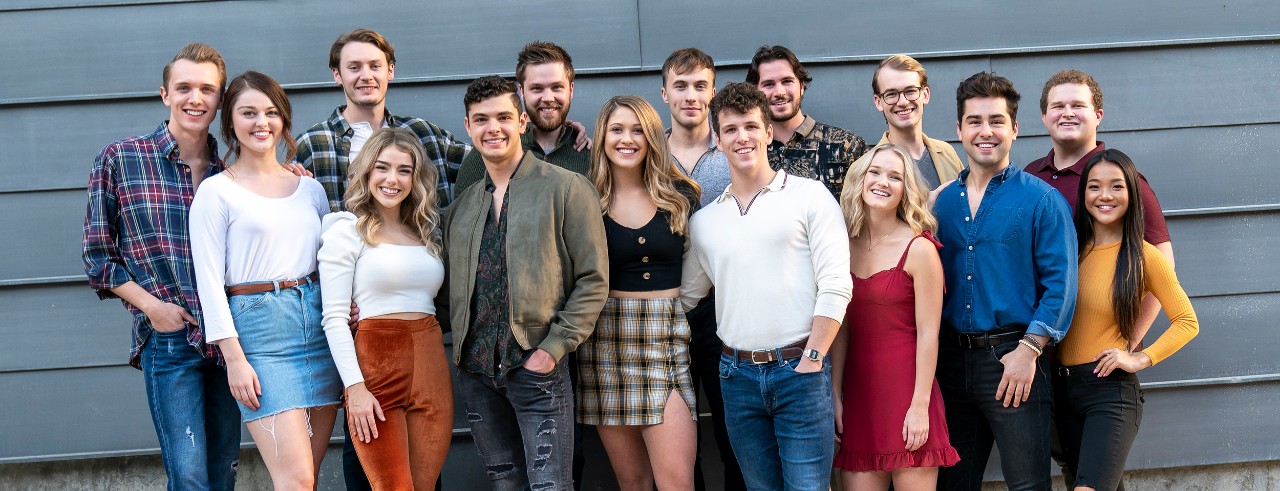 CCM Musical Theatre's Class of 2020 stands in front of a building