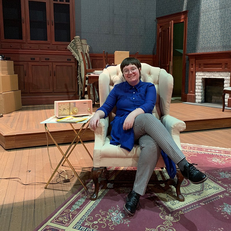 Marissa Picciuto sits on stage of CCM's "Clybourne Park"