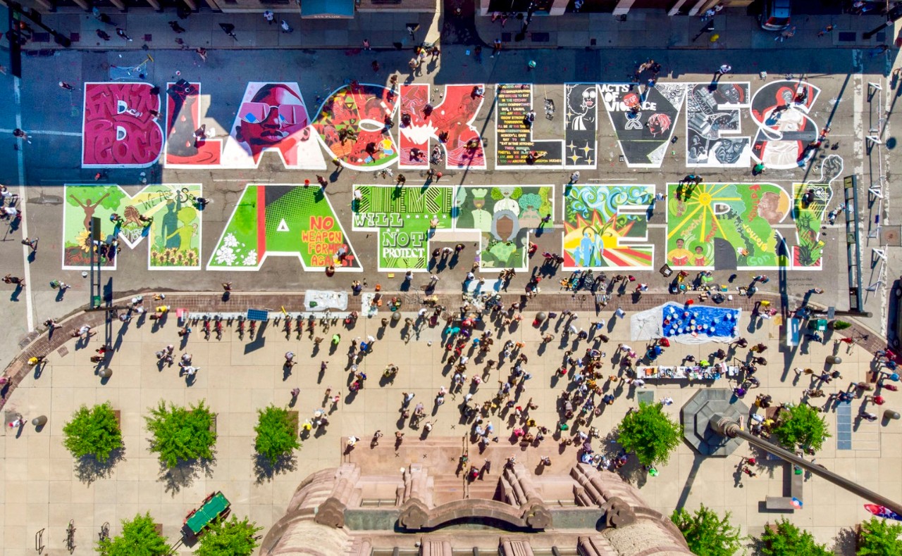 Aerial view of Cincinnati's new Black Lives Matter mural designed in the colors of red, black and green.