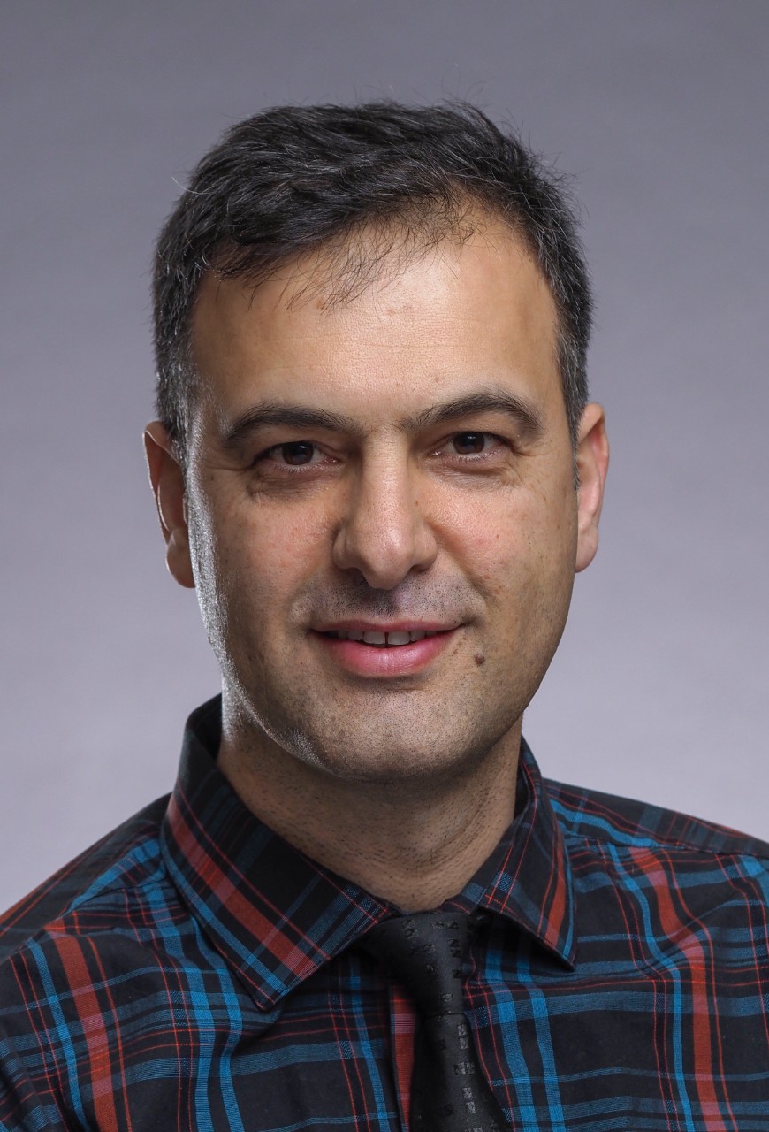 headshot of Professor Murat Ozer