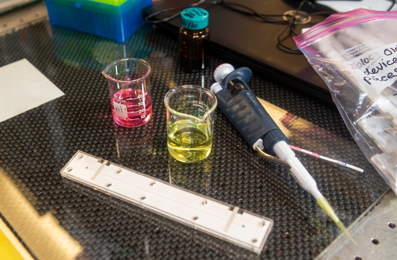 Lab equipment on a bench.
