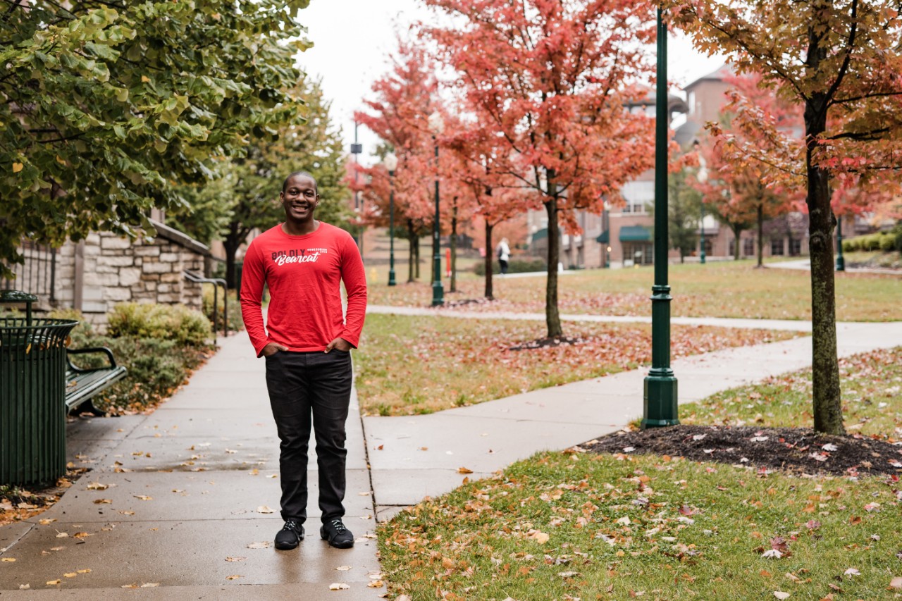 Noah Oki poses on campus