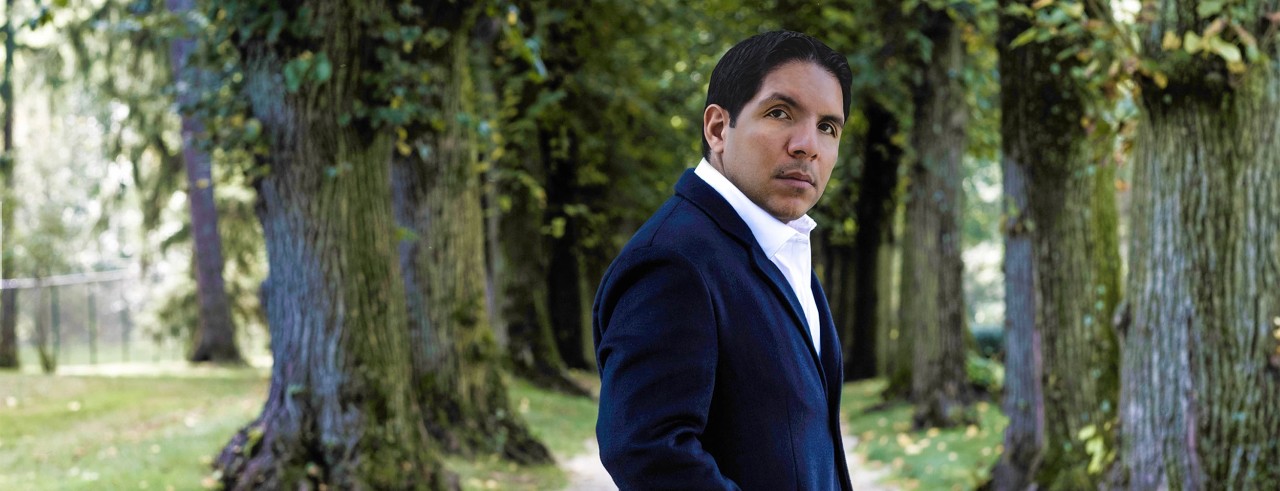 A headshot of Isaí Jess Muñoz