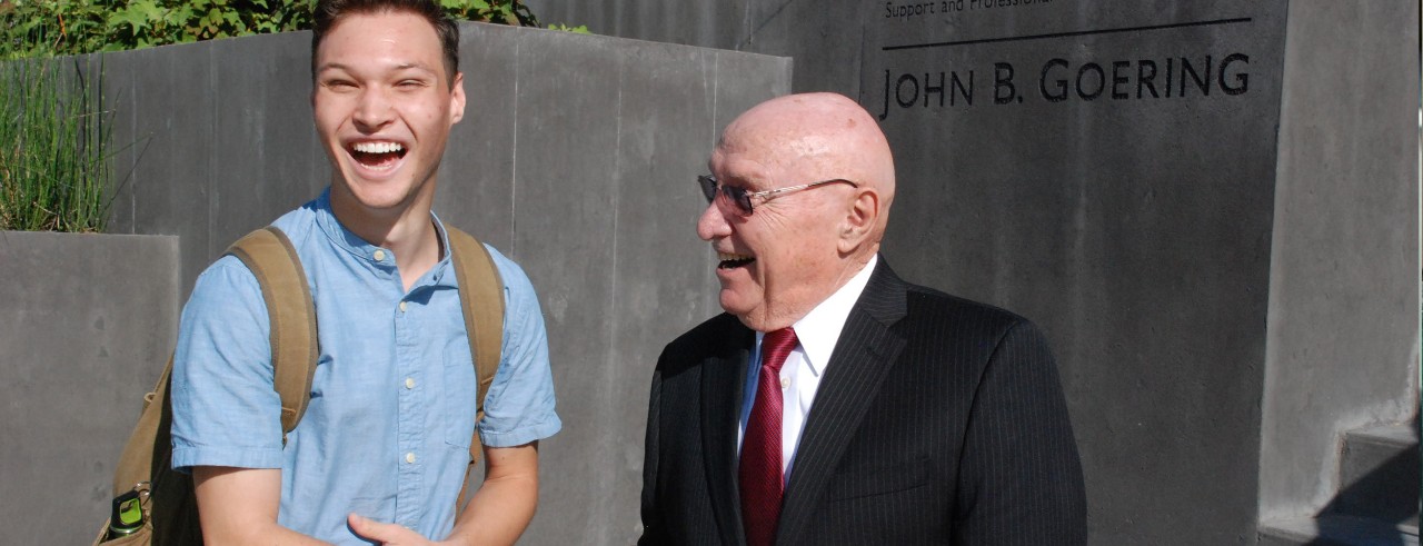 student and john goering laughing