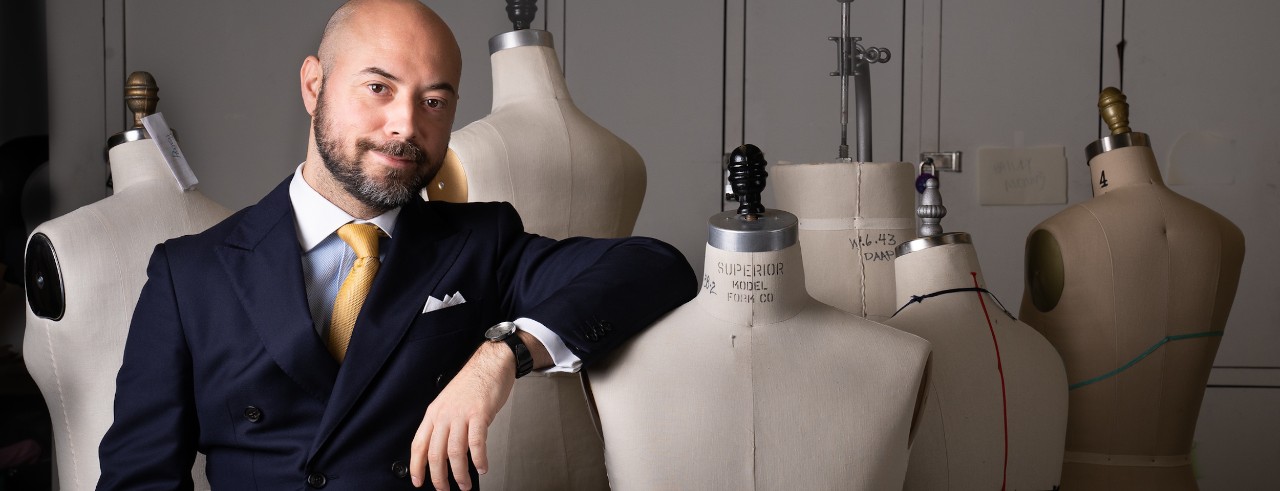 Gjoko Muratovski poses with model forms