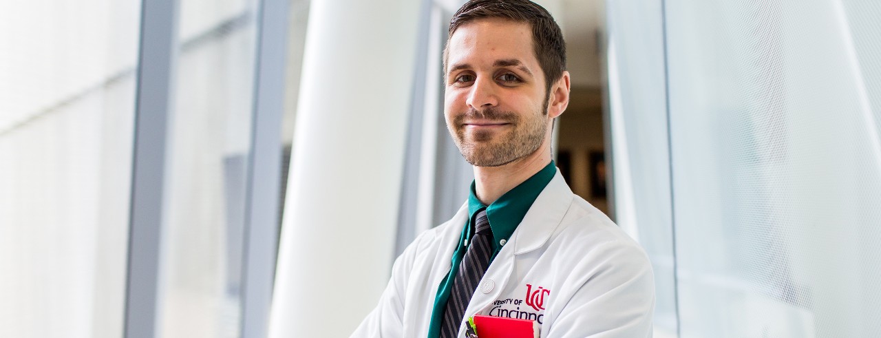 male in white lab coat