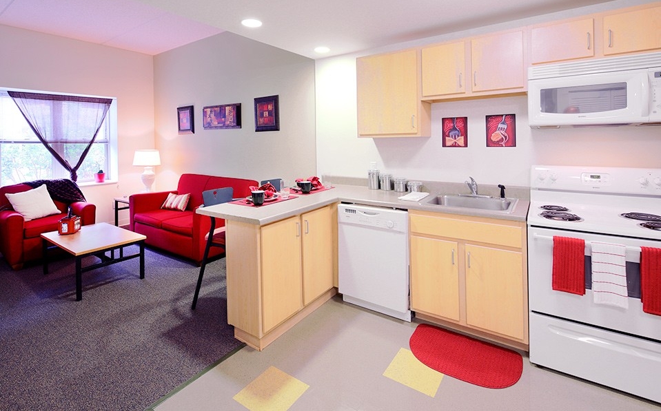 UPA apartment layout with kitchenette and living room