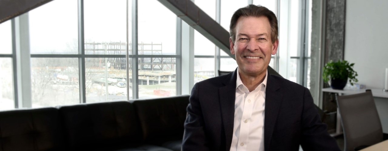 UC CIO David J. Adams sits in office overlooking the construction of the Digital Futures Complex buildings